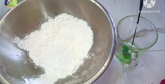Divide the dough into portions. Color each portion with food coloring and gradually add boiling water, kneading until smooth.