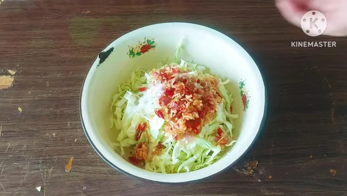 Season with turmeric, MSG, seasoning powder, and fish sauce. Add makrut lime leaves. Adjust the seasoning to your taste.