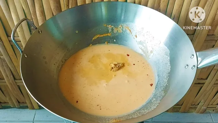 Add palm sugar, seasoning powder, and water. Stir until the sugar dissolves.