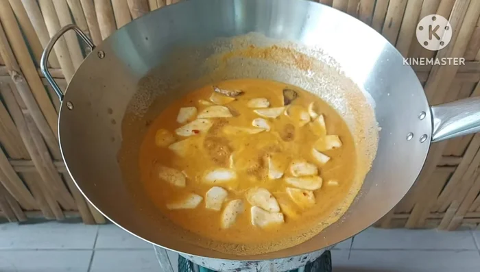 Add the tofu. Gently stir to avoid breaking it.