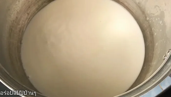 Heat coconut milk and cream in a pot for about 5 minutes until it begins to separate.