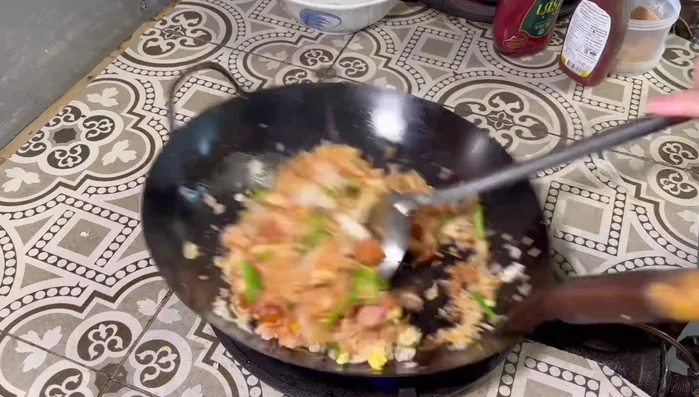 Add spring onions and stir-fry until everything is well combined.