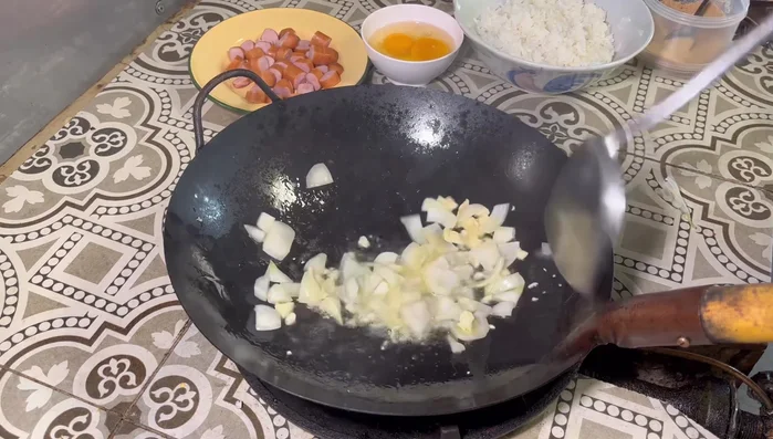 Add the onion and fry until cooked and translucent.