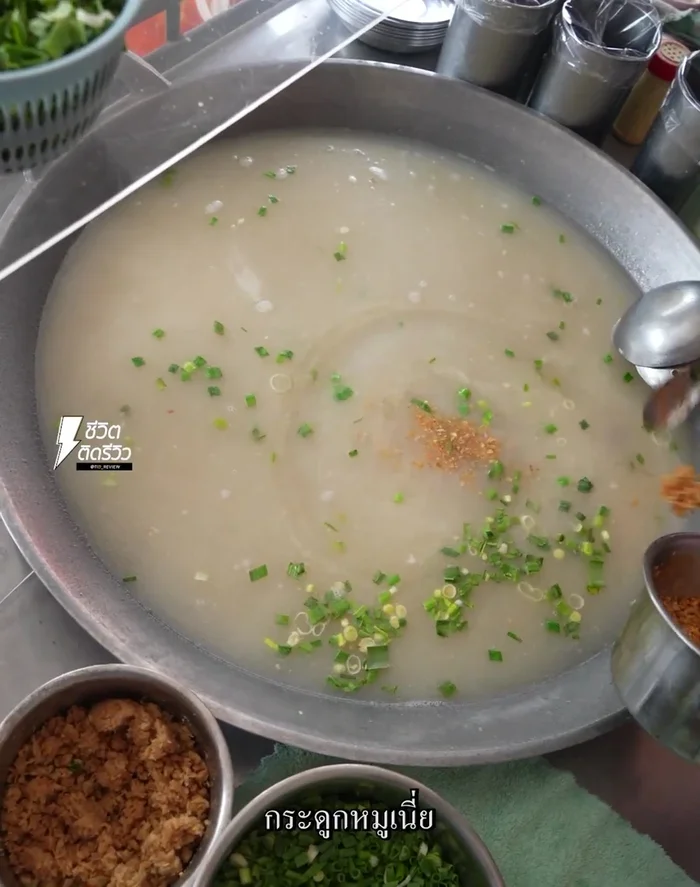 Use the stock (from boiling bones and eggs) to adjust the consistency of the porridge, adding as needed.