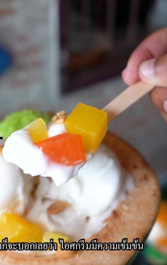 Blend coconut water with other ingredients (refer to original recipe, likely including sugar and cream).
