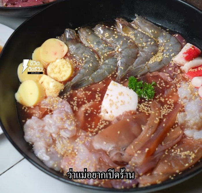Marinate the pork using a secret recipe (specific ingredients not detailed in the transcript).