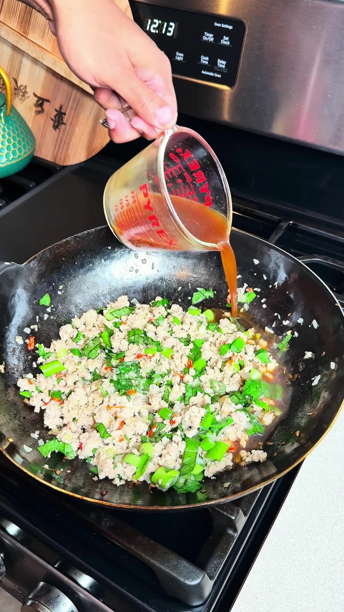 Add the sauce: Pour the sauce mixture over the chicken. Cook for about 5 minutes, or until thickened.