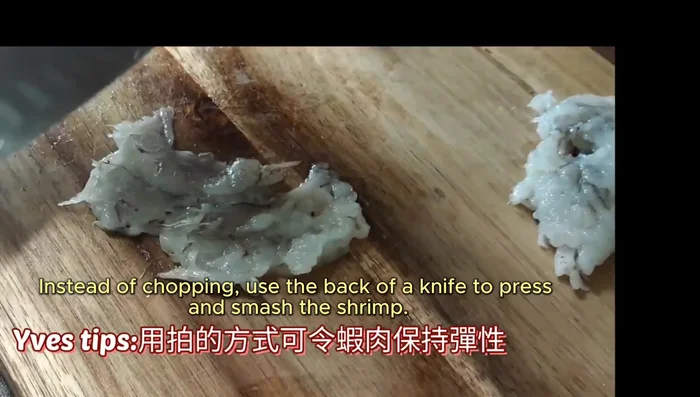 Make shrimp paste using the back of a knife to press and smash the shrimp. This keeps the texture bouncy.