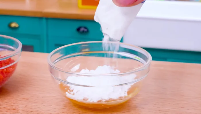 Dip chicken in egg and milk mixture, then coat with Cheetos.
