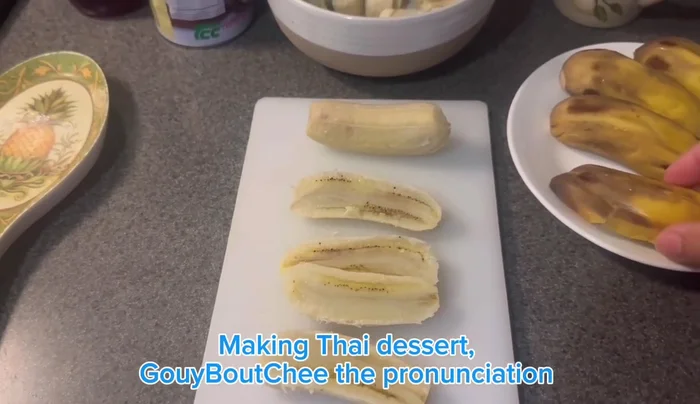 Boil whole bananas until cooked. Let them cool, peel, and cut in half. Then cut each half into 4 pieces.