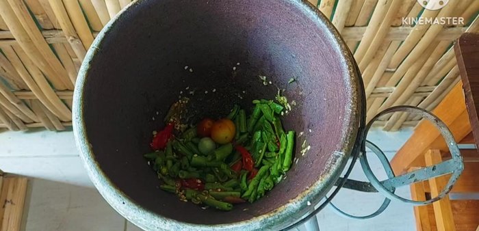 Add the chopped tomatoes (orange and cherry tomatoes).