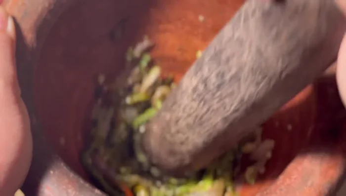 Grind the fried chili mixture in a mortar and pestle until finely ground but not overly smooth. Add fried shallots.