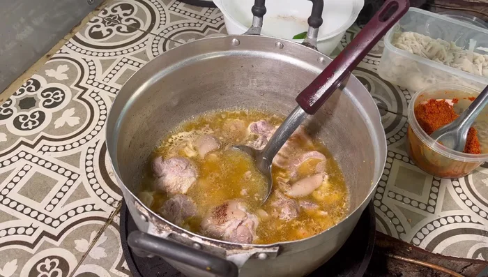 Add a small amount of shrimp paste. Adjust the spiciness by adding more curry paste if needed.