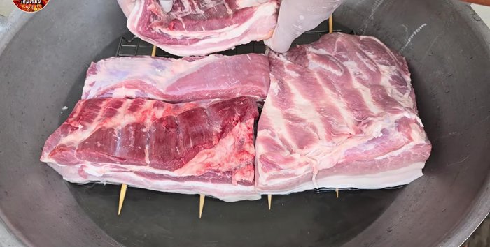 Boil the pork belly for 15 minutes. This makes the skin less tough.