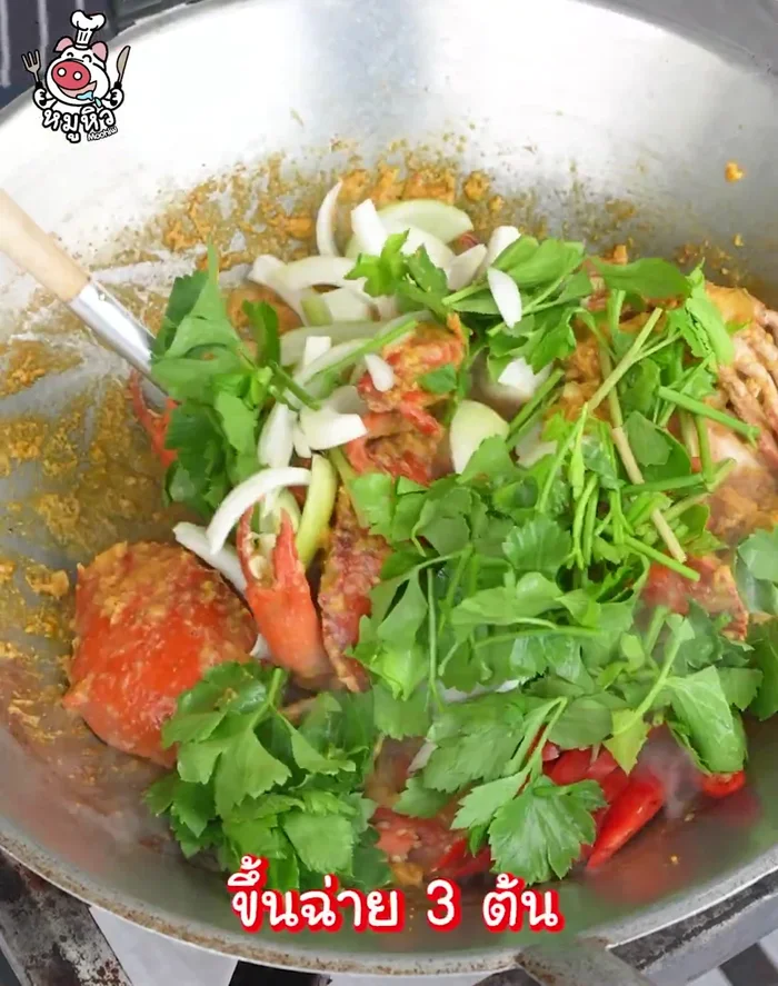 Add the chopped onions and chili peppers. Stir-fry and mix everything until cooked through.