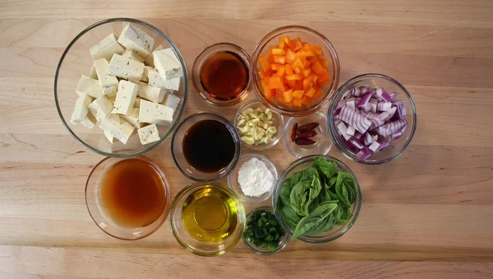 Drain and dice the tofu.