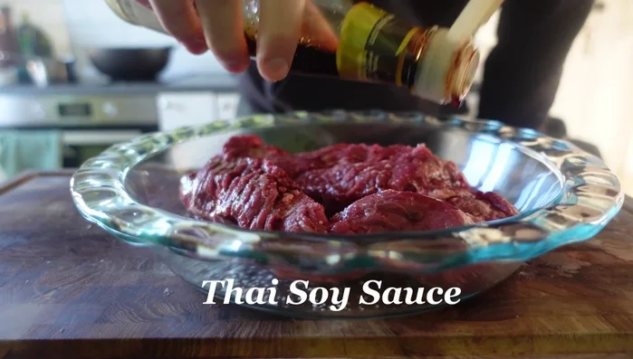 Marinate the steak: In a bowl, combine soy sauce, fish sauce, minced garlic, sugar, white pepper, and oyster sauce. Massage the marinade into the steaks. Refrigerate for at least 30 minutes, or preferably overnight. (173.2)