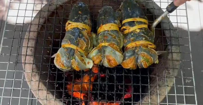 Pour in enough water to cover the fish. Add fish sauce and palm sugar to taste.