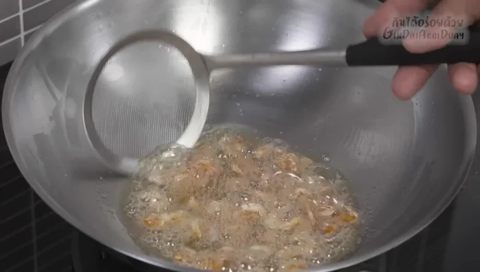 Add dried shrimp and continue frying over low heat until fragrant and crispy.
