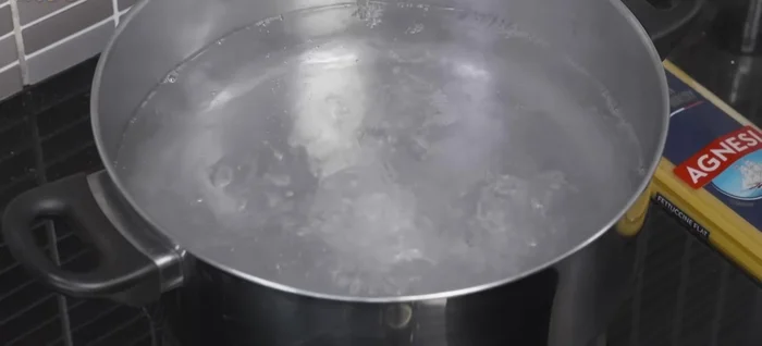 Boil water in a pot. Add salt once boiling. Add fettuccine and cook for 6-8 minutes until al dente.