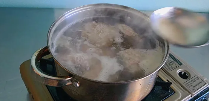 Boil for a while, skimming off any foam that rises to the surface.