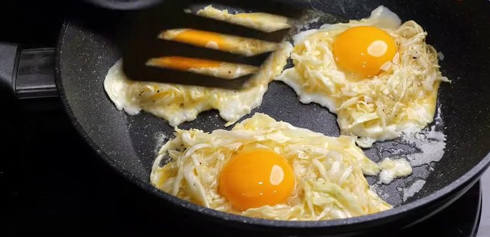 Add the prepared cabbage to the pan.