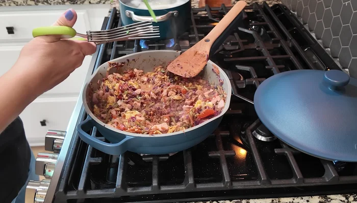 Stir in most of the green onions, reserving some for garnish.