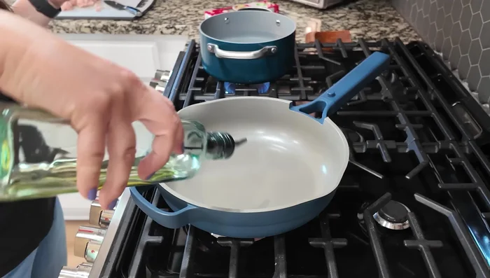 Heat oil in a large skillet over medium-high heat.