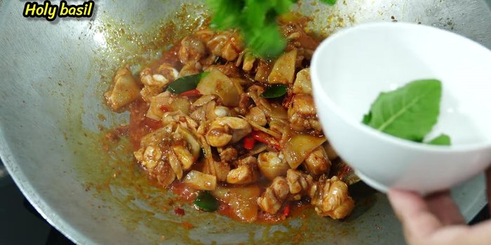 Add basil leaves and stir-fry until cooked.