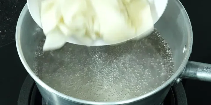 Boil the pickled bamboo shoots for about 5 minutes. Cut them into small pieces beforehand.
