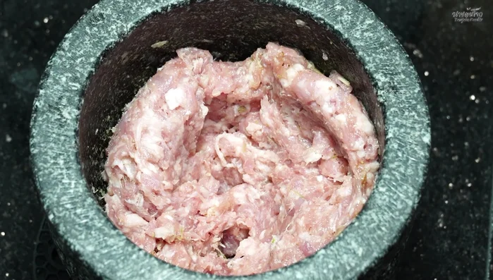 Marinate the pork mixture for about 10 minutes.