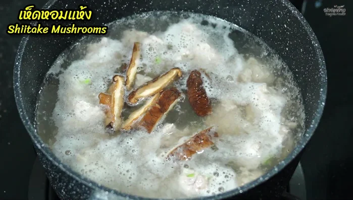 Add soaked and chopped shiitake mushrooms.