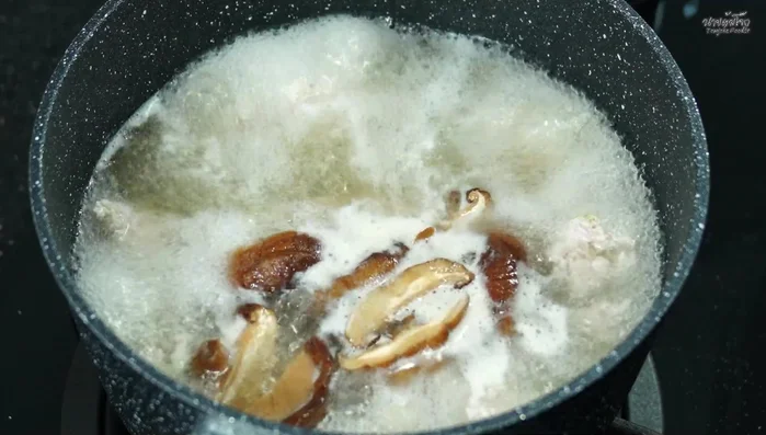 Once the pork is cooked, add the cooked rice.