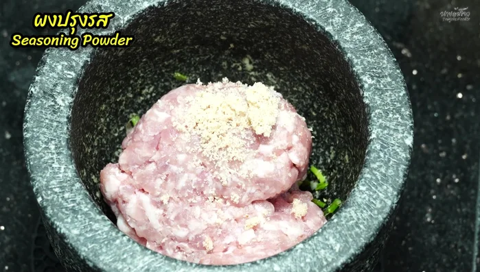 Add seasoning powder, fish sauce, and a small amount of onion (if desired). Mix thoroughly.