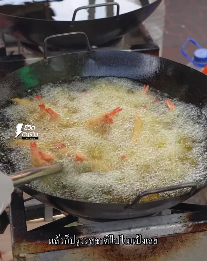 Coat seafood: Dip each piece of seafood into the batter, ensuring it's fully coated.