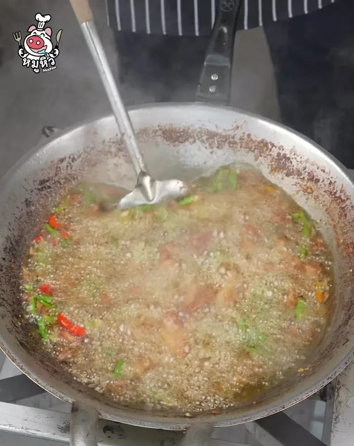 Fry until the pork is cooked through and slightly browned. Remove from pan and let the oil drain.