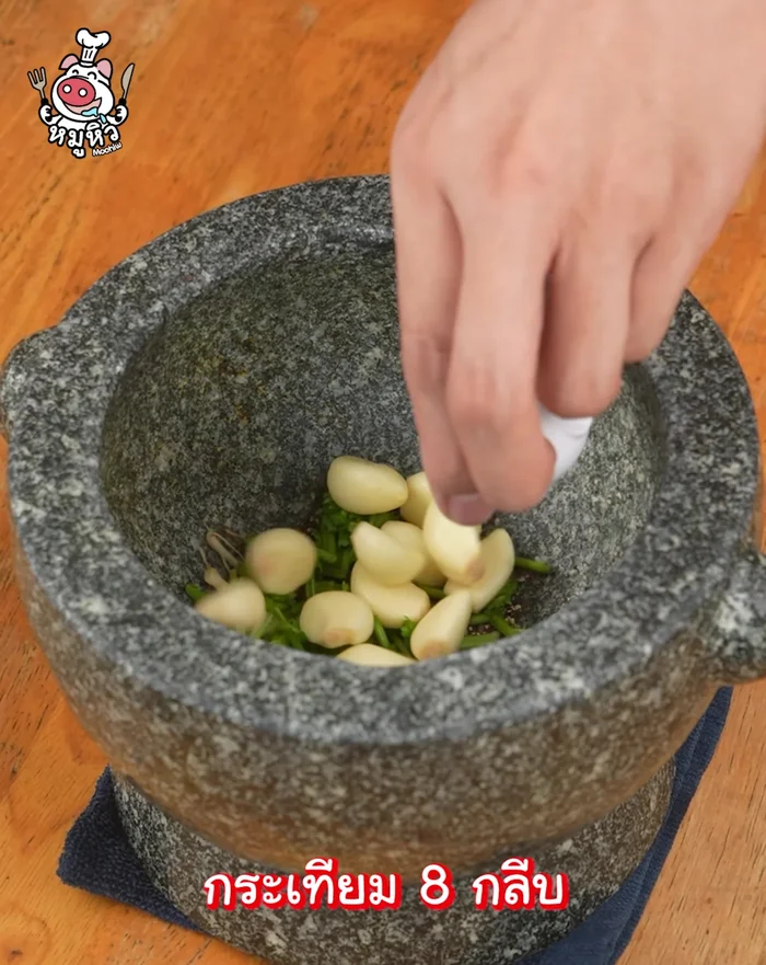 Add vegetable roots, cheese, and garlic to the mortar and pound.