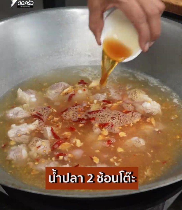 Add the prepared Chinese kale, fish sauce, and sugar. Mix well and cook until everything is tender.