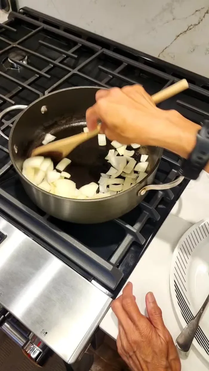 Add the pre-cut and marinated beef to the onions.