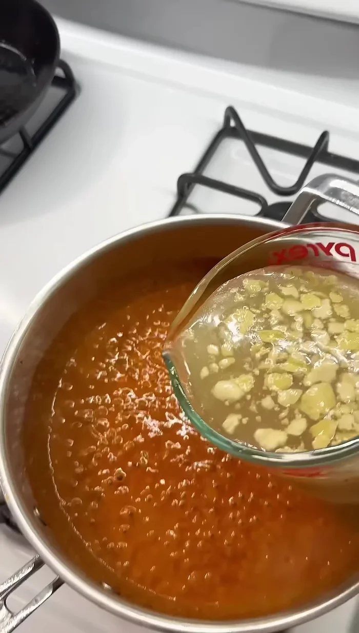 Add two cups of chicken stock and reduce.