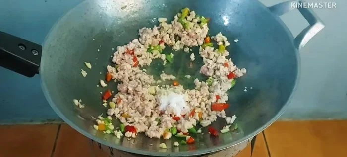 Season with sugar, light soy sauce, and oil to taste.