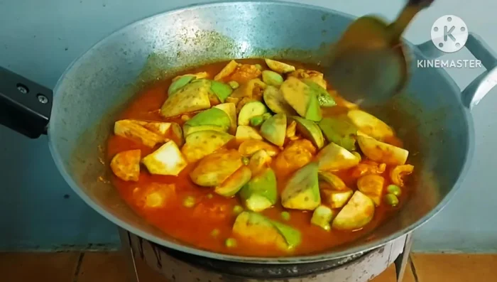 Cover and simmer until everything is cooked.