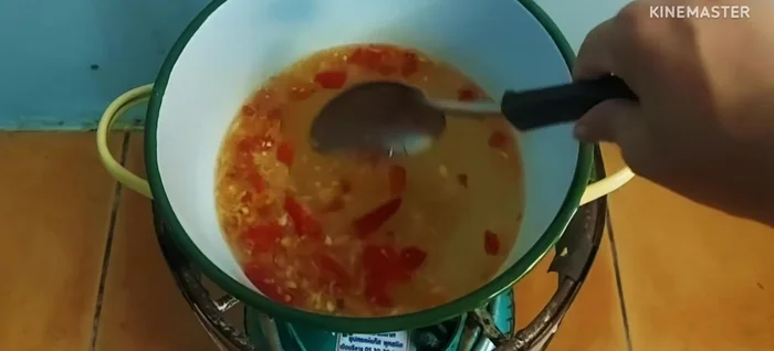 Add seasoning: MSG and fish sauce.