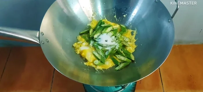 Add seasoning powder, sugar, and white soy sauce. Stir-fry until the okra is cooked through.