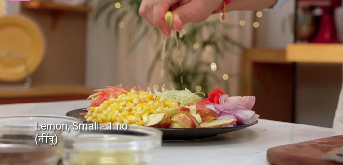 Grate carrots and add to the other prepared vegetables. Add a small amount of salt and lemon juice to the vegetables and mix gently. Set aside for 5 minutes to release excess water.