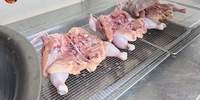 Sun-dry the chicken: Place the marinated chicken in direct sunlight for 3-4 hours, flipping occasionally to ensure even drying.