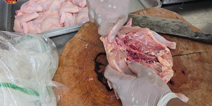 Prepare the chicken: Remove internal organs and cut into smaller pieces. Slightly flatten thicker parts for even cooking.