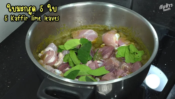 Add kaffir lime leaves while stir-frying.