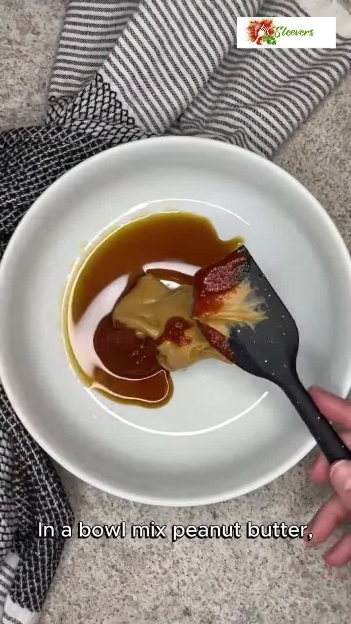 Make the marinade: In a bowl, mix peanut butter, soy sauce, Sriracha, sweet chili sauce, lime juice, and salt. Add hot water and stir until smooth.