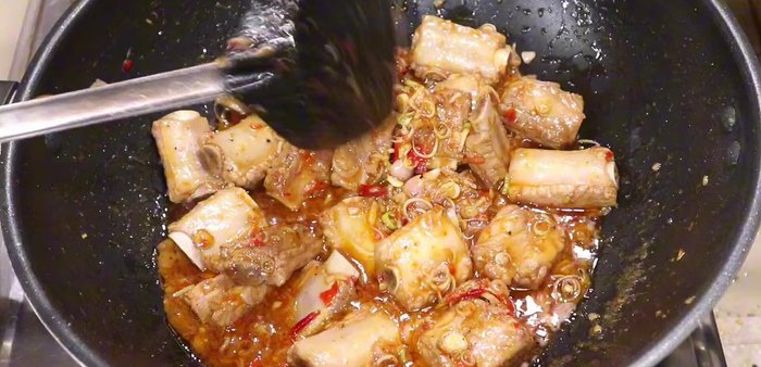 Serve hot with rice. (Final step, video details needed)